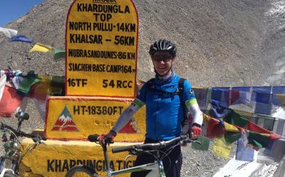 Graham Crawford Cycling on the  tour with redspokes